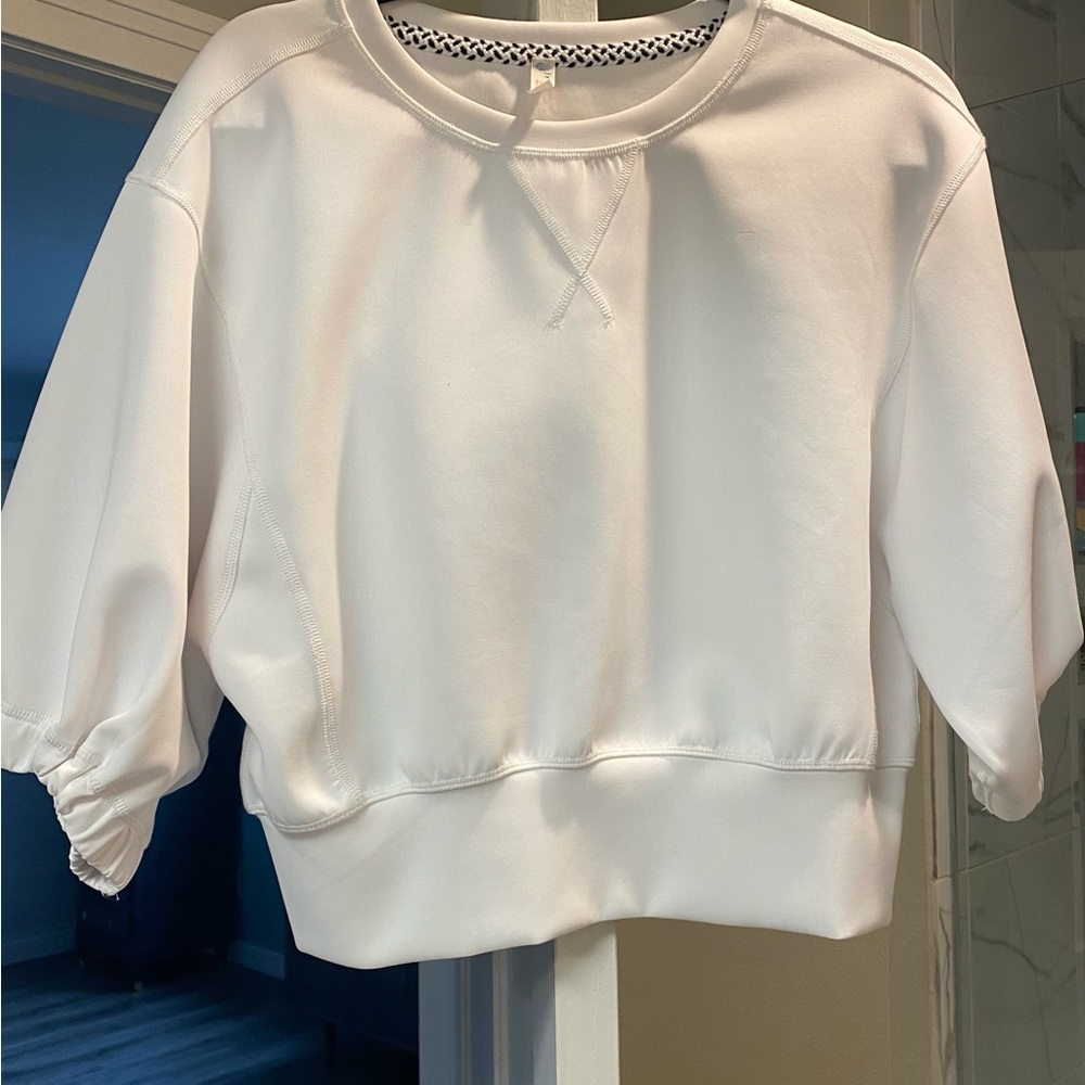 Free people top, has that scuba type material